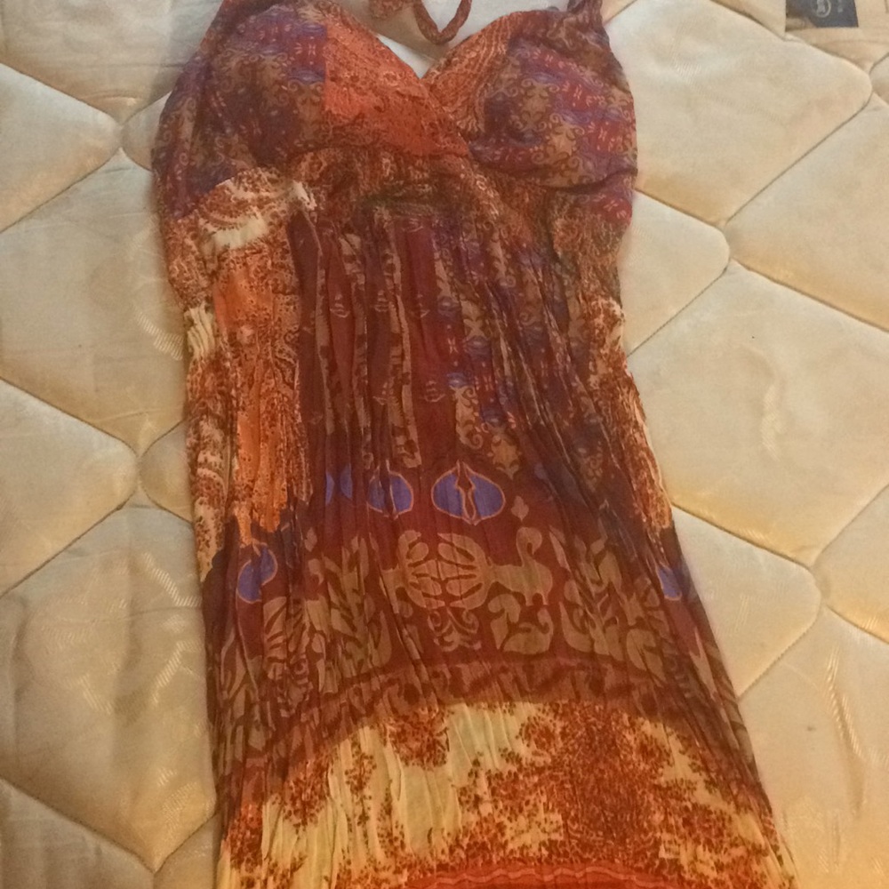 A colorful neck tie dress that’s a little backless